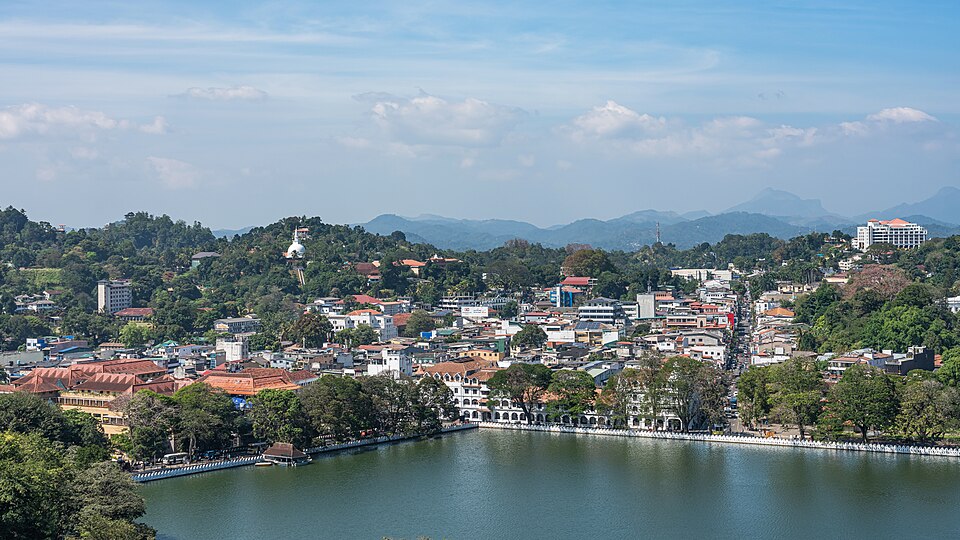 Kandy lake and city framed by hill-country mountains